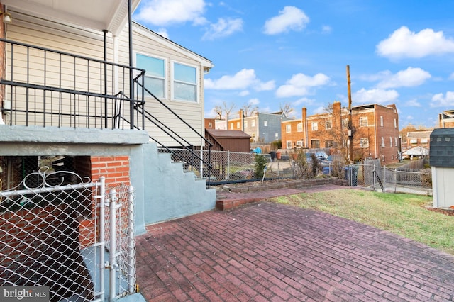 exterior space with a gate and fence