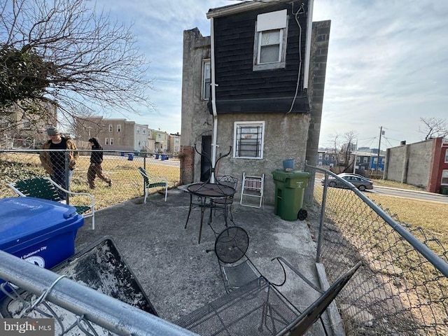 rear view of property with a patio