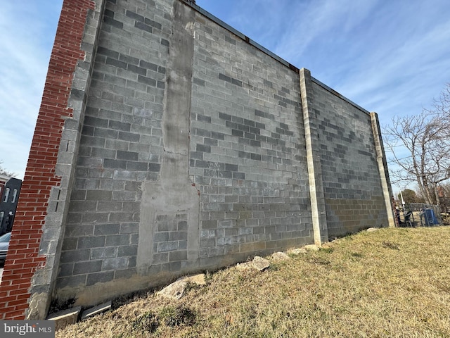 view of property exterior featuring a yard