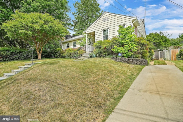 exterior space featuring a front lawn