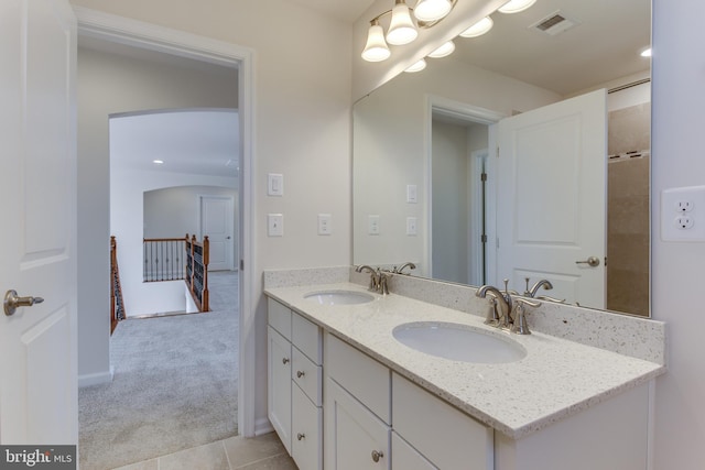 bathroom featuring vanity and tile patterned floors