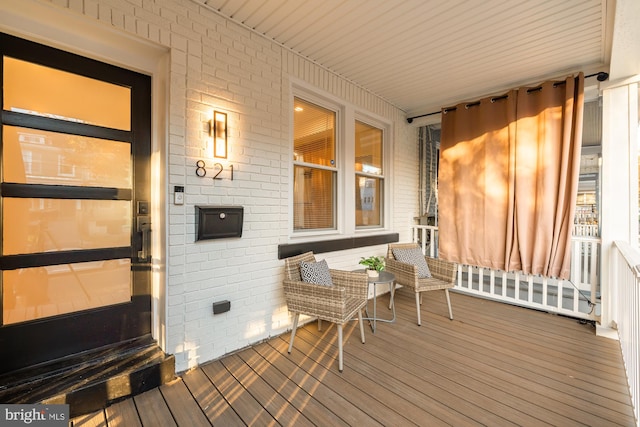 wooden deck with a porch