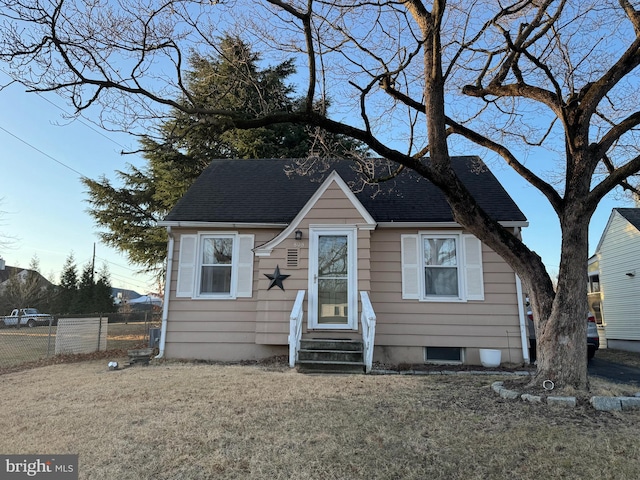 bungalow with a front lawn