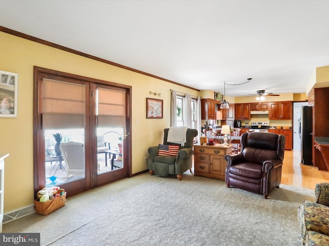 carpeted living room featuring crown molding