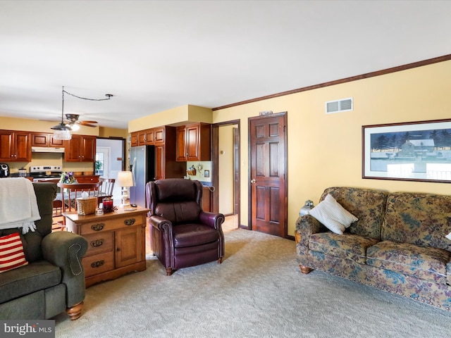 carpeted living room featuring crown molding