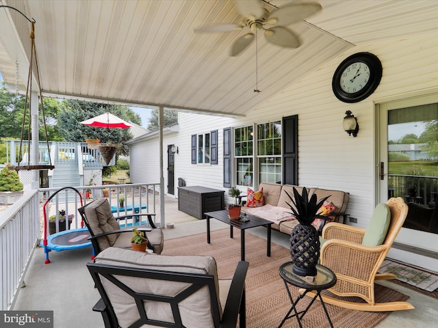 view of patio with outdoor lounge area and ceiling fan