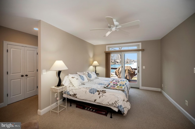 bedroom with access to exterior, ceiling fan, and carpet flooring