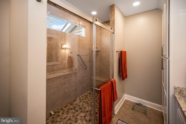 bathroom with vanity and an enclosed shower