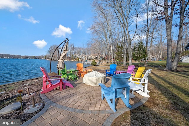 view of patio featuring a water view