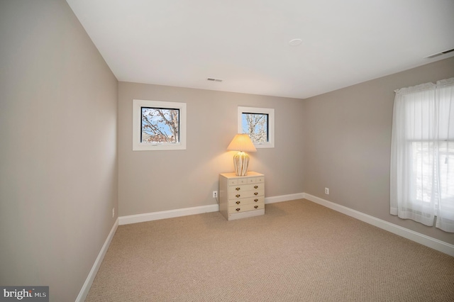 view of carpeted spare room