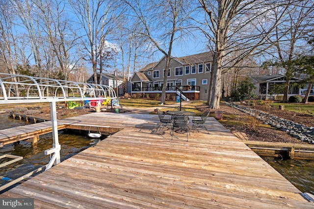 dock area with a water view