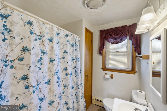 bathroom featuring a shower with curtain, a baseboard heating unit, and toilet