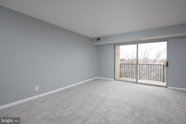 empty room with carpet flooring