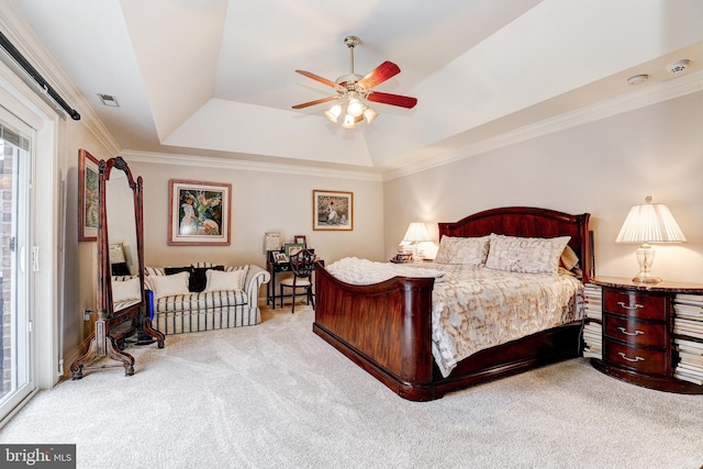 bedroom with ornamental molding, access to outside, ceiling fan, a raised ceiling, and light carpet