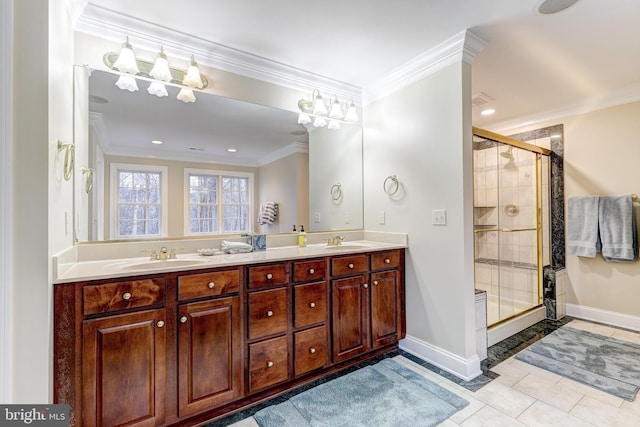 bathroom featuring vanity, crown molding, a shower with shower door, and tile patterned floors