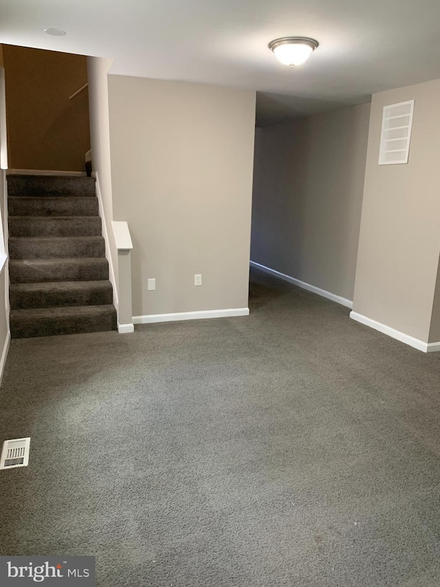 interior space with dark carpet