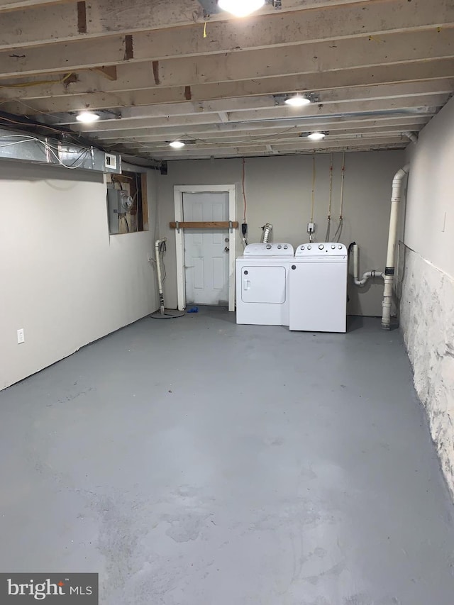 basement featuring washer and dryer