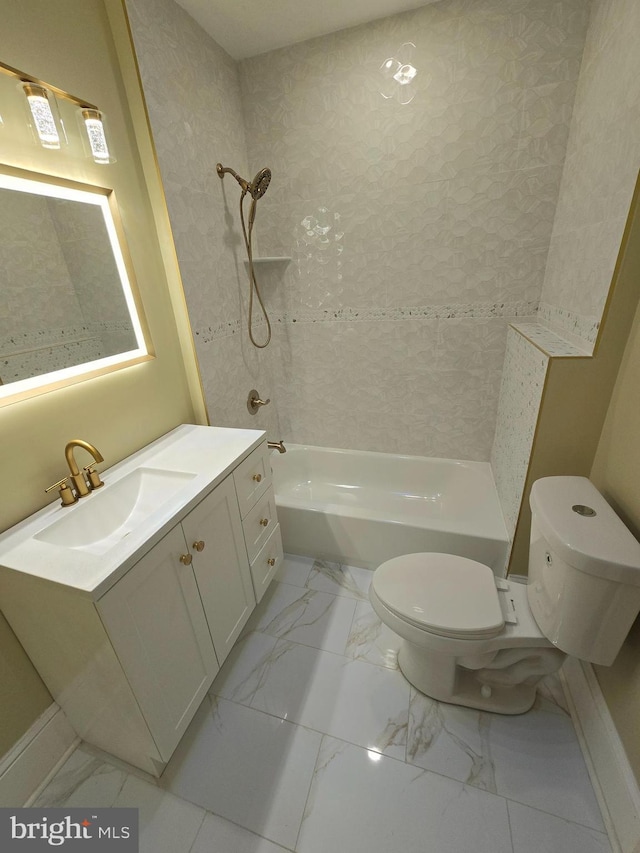 full bathroom with tiled shower / bath, vanity, and toilet