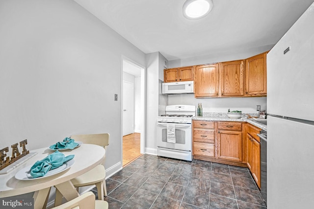 kitchen with white appliances