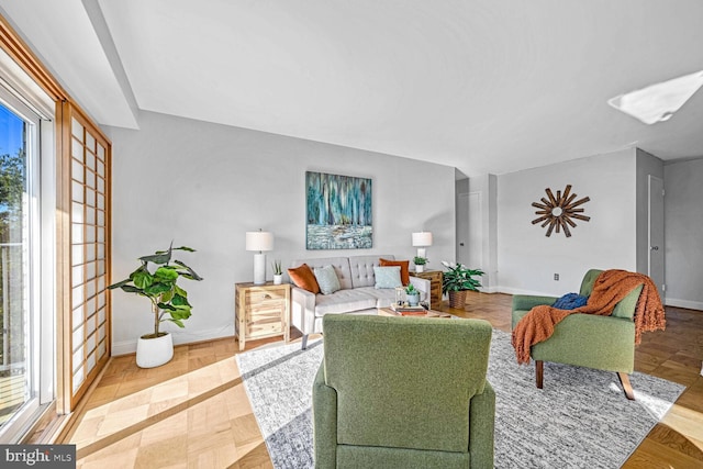 living room with light parquet floors