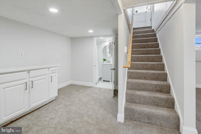 stairway with carpet flooring