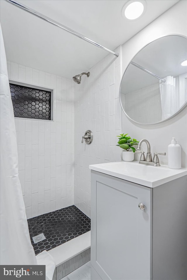 bathroom with vanity and a shower with curtain