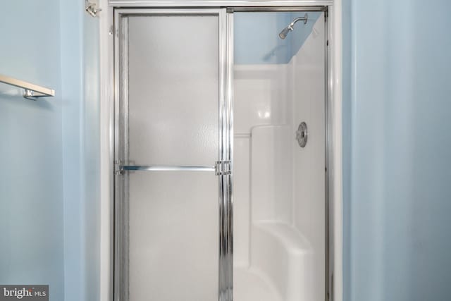 bathroom with an enclosed shower