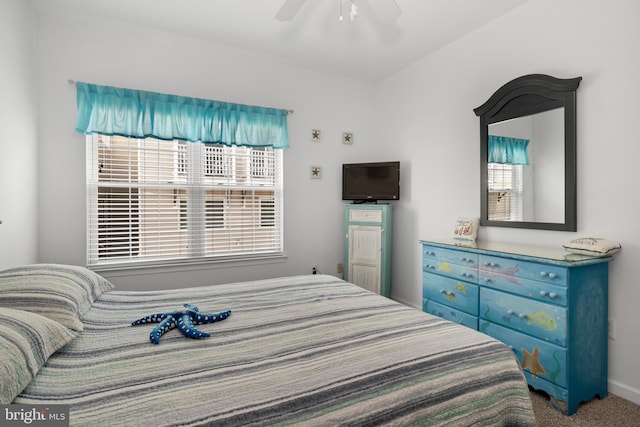 bedroom featuring ceiling fan and carpet floors