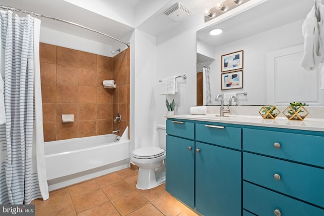 full bathroom with tile patterned flooring, vanity, shower / tub combo with curtain, and toilet