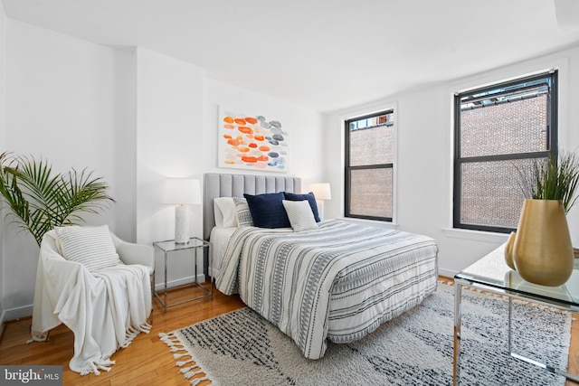 bedroom featuring hardwood / wood-style floors