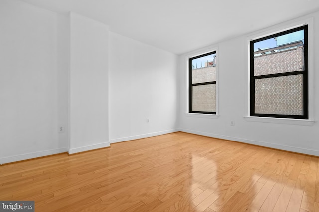 empty room featuring light hardwood / wood-style floors