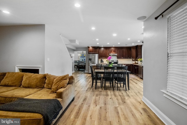 living room featuring light wood-type flooring