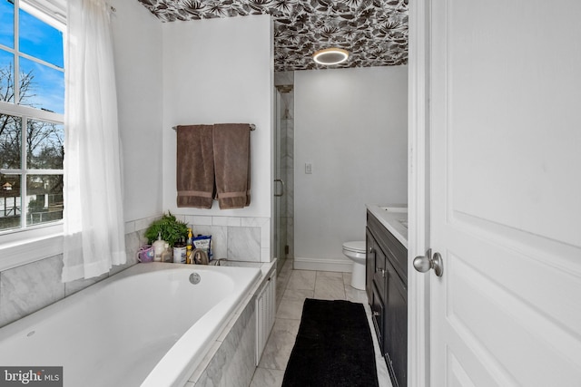 full bathroom with toilet, vanity, and shower with separate bathtub