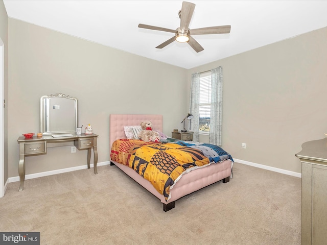 bedroom with carpet floors, baseboards, and a ceiling fan