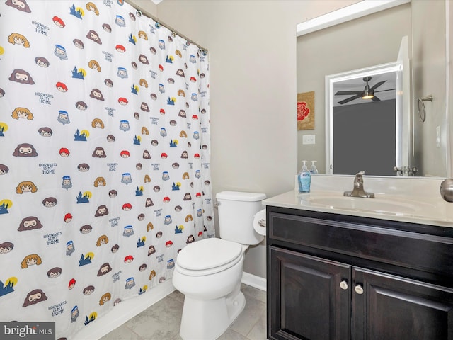 bathroom featuring a shower with shower curtain, toilet, ceiling fan, vanity, and tile patterned floors