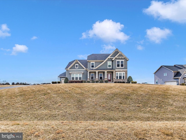 view of front facade with a front lawn