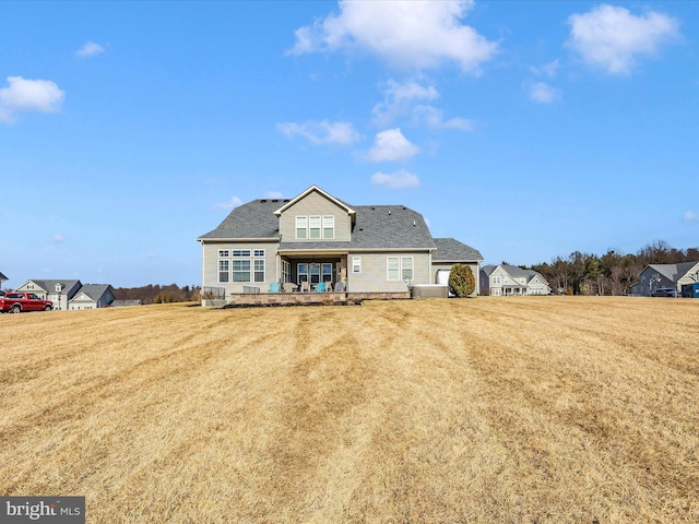 view of front of home featuring a front lawn