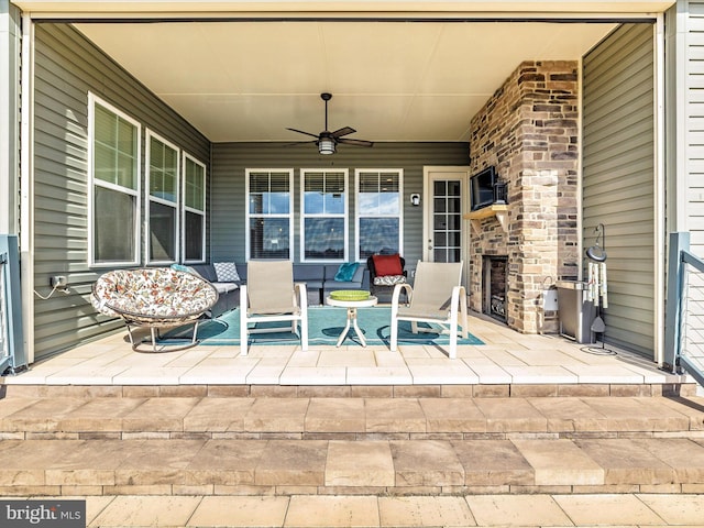 view of patio featuring a ceiling fan and covered porch