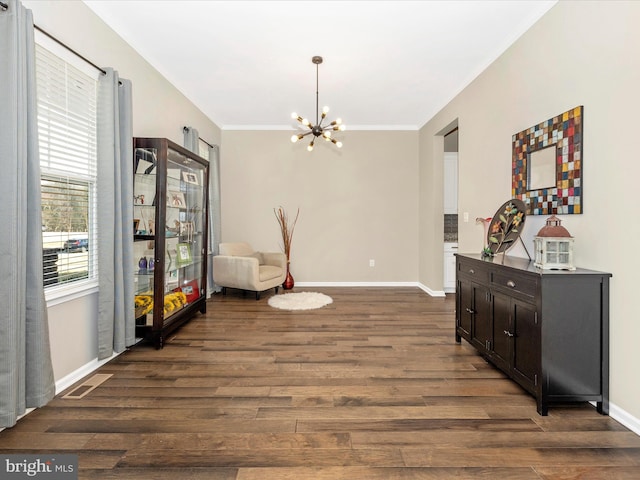 dining room with baseboards, visible vents, dark wood-style flooring, and ornamental molding