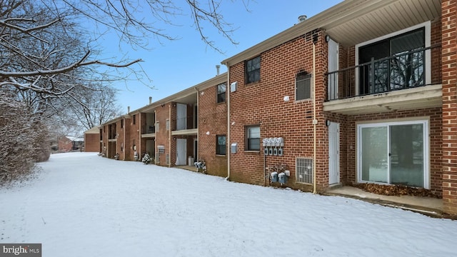 view of snow covered property