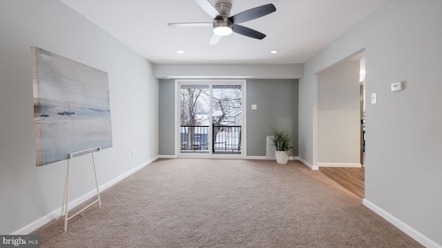 empty room with baseboards and carpet flooring