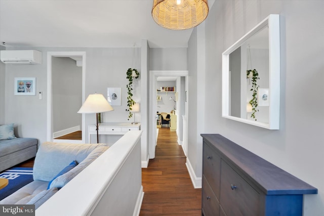 hall featuring dark wood-type flooring and a wall mounted air conditioner