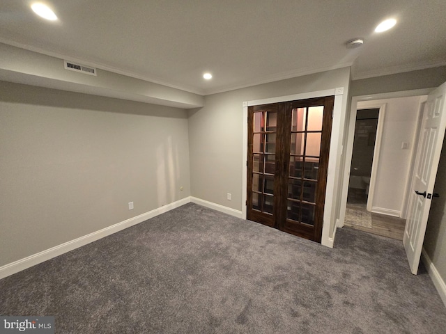 unfurnished room with visible vents, ornamental molding, french doors, carpet flooring, and baseboards