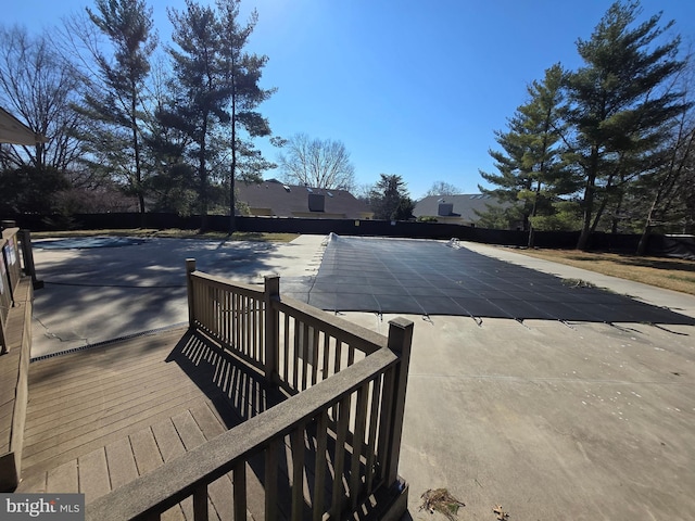 view of pool featuring a fenced in pool, a patio, and fence