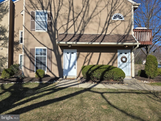 exterior space featuring a front lawn