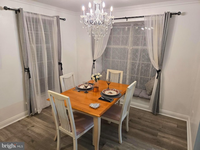 dining room with a chandelier, baseboards, wood finished floors, and ornamental molding