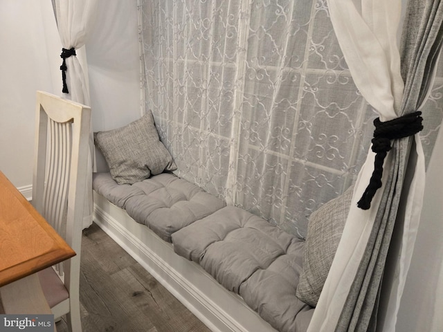 bedroom featuring wood finished floors