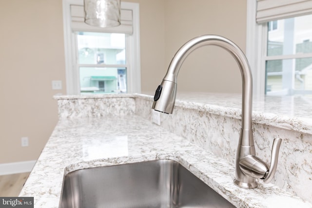 details with light stone counters and sink