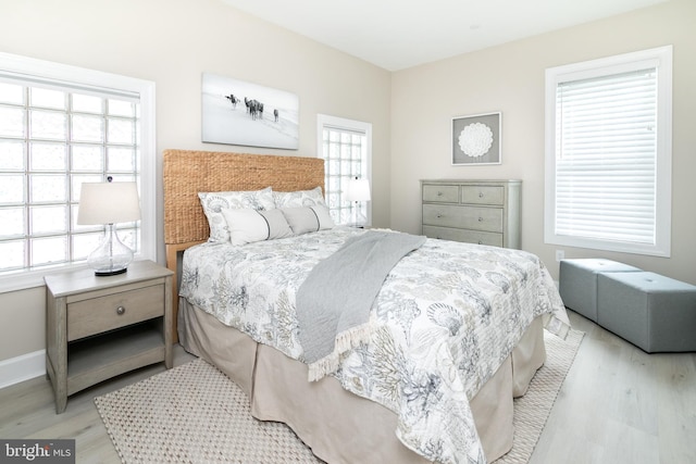 bedroom featuring light hardwood / wood-style floors