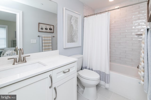 full bathroom with shower / bath combination with curtain, tile patterned floors, toilet, and vanity